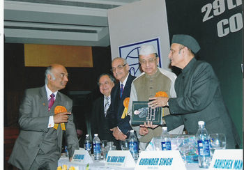Dr. Singh's text book "Bhupendra Acupuncture Techniques" being released by Dr. Karan Singh
